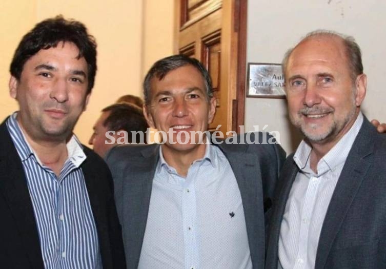 Clemente, junto a Pusineri y Perotti.